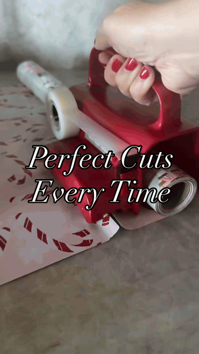 Gift wrap cutter demo — slide to cut, built-in tape dispenser